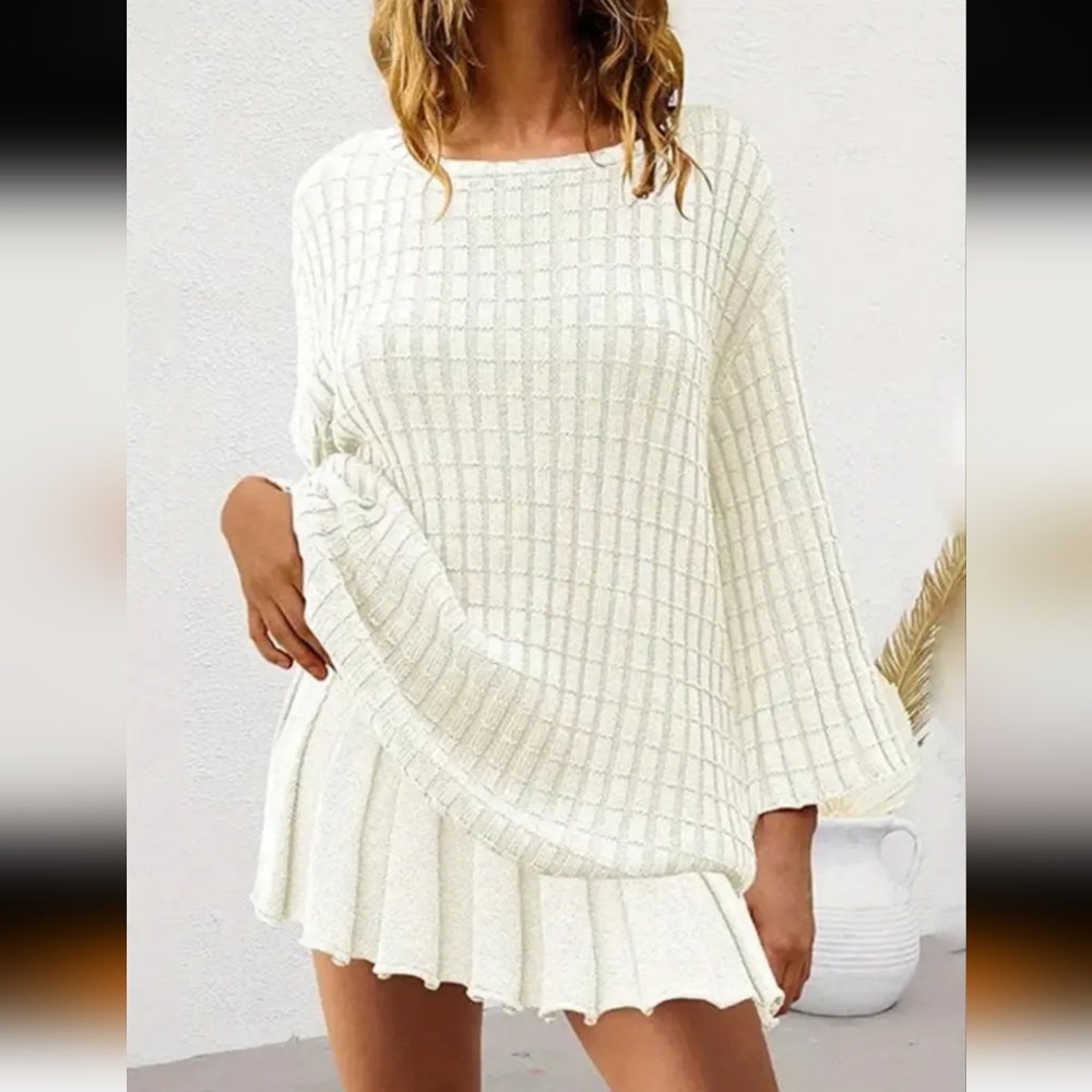 NWT cream-colored knit set with slouchy sweater and pleated skirt, size medium.